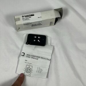 Interlogix 600-1064-95R Micro KeyFob 319.5 MHz SAW Security Remote Rev B Black